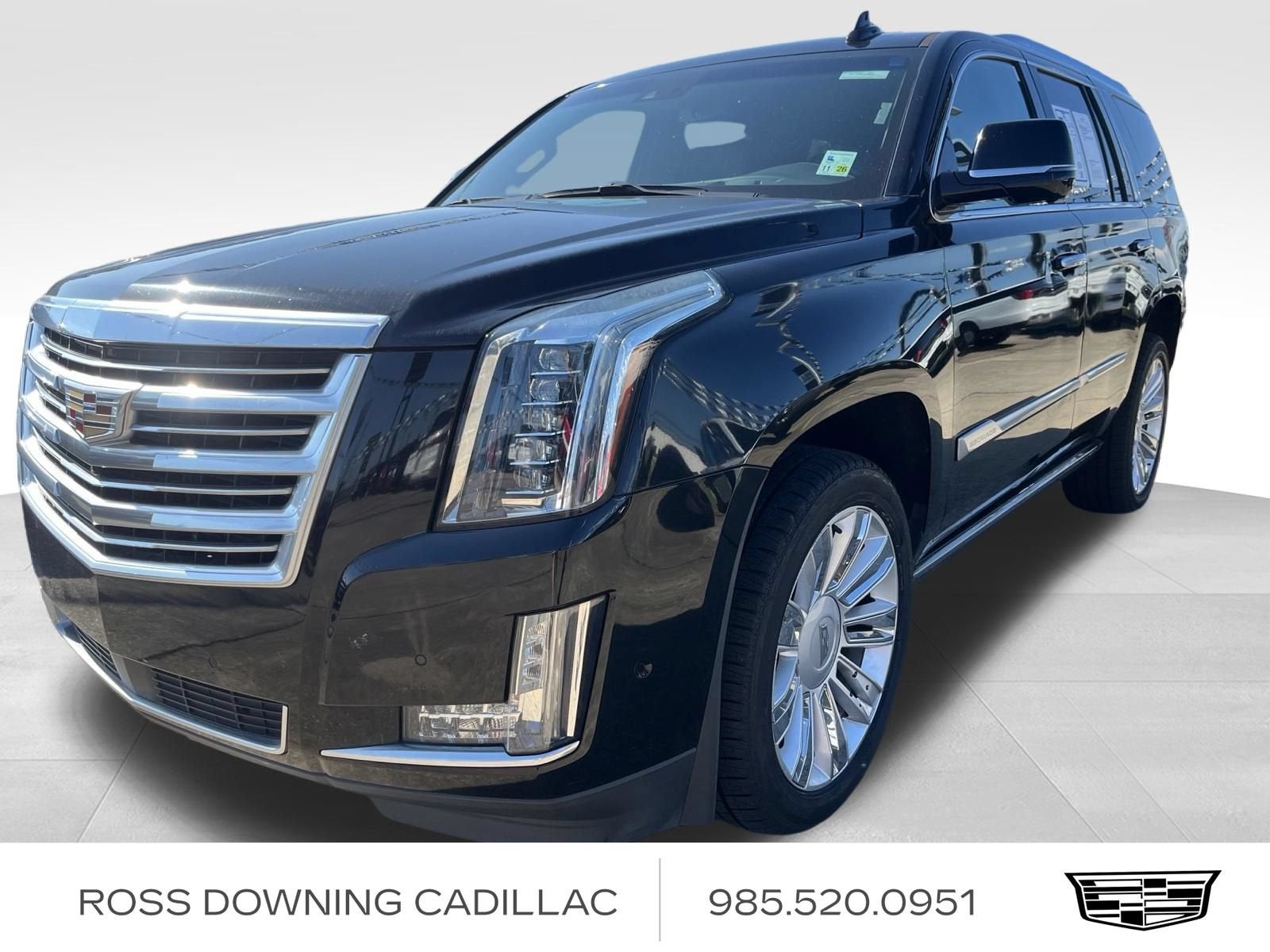 2019 Cadillac Escalade Platinum in Black Raven — front three-quarter view